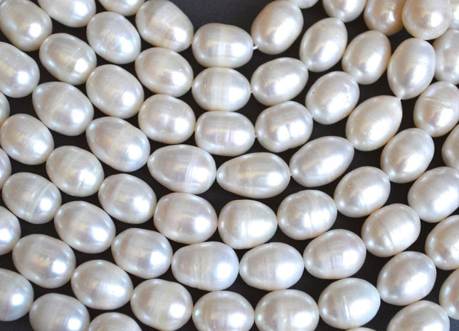 10-11x13-14 mm AA Natural White Rice/Oval Freshwater Pearl Genuine Natural Freshwater Pearl 26 Beads #86