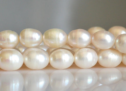 10-11x13-14 mm AA Natural White Rice/Oval Freshwater Pearl Genuine Natural Freshwater Pearl 26 Beads #86