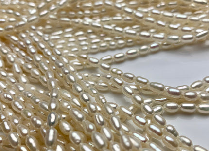 4x6.5-7 mm AA Tiny White Long Rice Oval Freshwater Pearls Long Oval Shape Seed Beads #1413