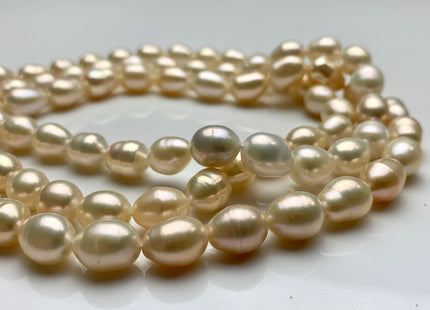 8.5x11 mm AA High Luster Rice/Oval Natural Pink Or Pale Peach Freshwater Pearl Beads Genuine Natural Color Freshwater Pearls. #1703