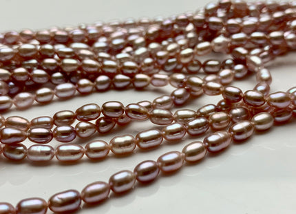 WHOLESALE 3.5-4x5 mm AAA Natural Mauve Pink Rice/Oval Freshwater Pearl Beads Genuine High Luster Mauve Pink Rice Freshwater Pearls #1868