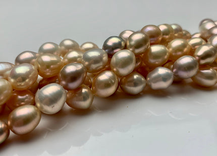 8.5x11 mm AA High Luster Rice/Oval Natural Pink Or Pale Peach Freshwater Pearl Beads Genuine Natural Color Freshwater Pearls. #1703