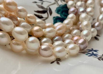 10-11x12-14 mm AAA Natural Mixed White Pink Mauve Rice Oval Shape Freshwater Pearl Beads Genuine Smooth And Shiny Pearls 34 Pieces #P1168
