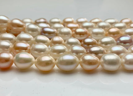 10-11x12-14 mm AAA Natural Mixed White Pink Mauve Rice Oval Shape Freshwater Pearl Beads Genuine Smooth And Shiny Pearls 34 Pieces #P1168