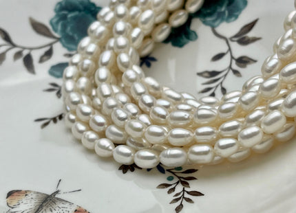 6x8-10 mm AA Natural White Rice Freshwater Pearl Beads Genuine Freshwater Rice / Oval Pearls High Luster Freshwater Pearl Beads #P1695