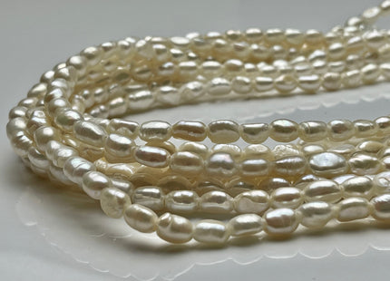 6-7x8.5-9 mm AAA Large Hole Natural White Rice Nugget Freshwater Pearls Hole Size 2.1mm Lustrous Genuine Rice Nugget Pearl Beads #P2016