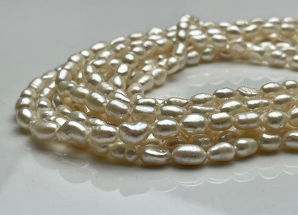5-6x9 mm AA Natural White Color Smooth Rice Nugget Freshwater Pearl Beads Genuine White High Luster Small Rice Nugget Pearls 46 Beads #P2063