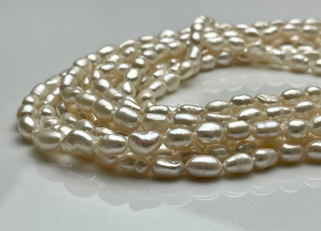 5-6x9 mm AA Natural White Color Smooth Rice Nugget Freshwater Pearl Beads Genuine White High Luster Small Rice Nugget Pearls 46 Beads #P2063