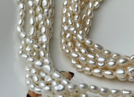 3-5x5-7mm AAA Natural White Smooth Rice Nugget Freshwater Pearl Beads Genuine White High Luster Tiny Rice Nugget Pearls 57 Beads #P2246