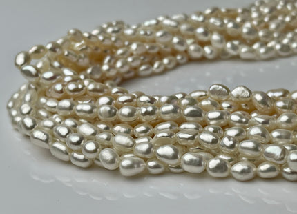 3-5x5-7mm AAA Natural White Smooth Rice Nugget Freshwater Pearl Beads Genuine White High Luster Tiny Rice Nugget Pearls 57 Beads #P2246