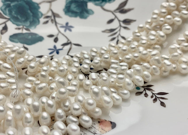 5x7mm 6x8mm AAA Top Drilled Natural White Rice Freshwater Pearl Beads Genuine Cultured Freshwater Pearls Smooth Natural Dancing Pearls #458