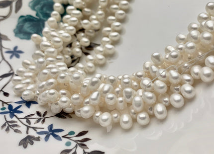 5x7mm 6x8mm AAA Top Drilled Natural White Rice Freshwater Pearl Beads Genuine Cultured Freshwater Pearls Smooth Natural Dancing Pearls #458