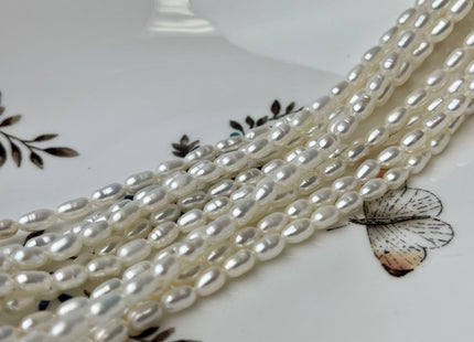 4x6.5-7 mm AA Tiny White Long Rice Oval Freshwater Pearls Long Oval Shape Seed Beads #1413