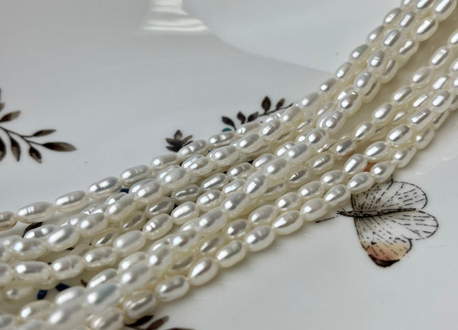 4x6.5-7 mm AA Tiny White Long Rice Oval Freshwater Pearls Long Oval Shape Seed Beads #1413