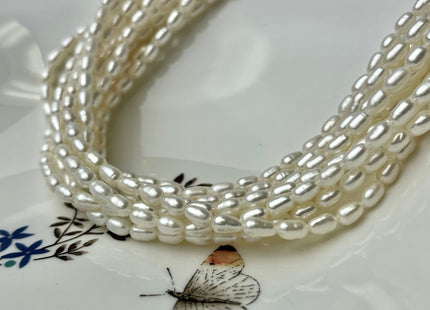 4x6.5-7 mm AA Tiny White Long Rice Oval Freshwater Pearls Long Oval Shape Seed Beads #1413