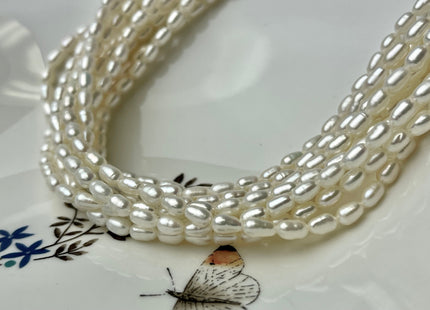 4x6.5-7 mm AA Tiny White Long Rice Oval Freshwater Pearls Long Oval Shape Seed Beads #1413