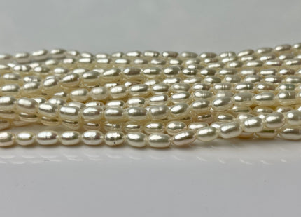 4x6.5-7 mm AA Tiny White Long Rice Oval Freshwater Pearls Long Oval Shape Seed Beads #1413