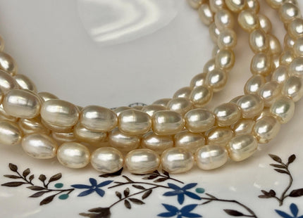 7x9 mm AAA High Luster Multi Light Gold Champagne Rice/Oval Freshwater Pearl Beads Genuine Freshwater Pearl #P2581