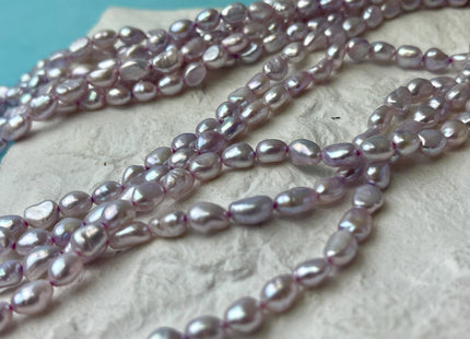 5x6-7 mm Lavender Purple Rice/Oval Nugget Freshwater Pearl Beads Genuine Lavender Purple Freshwater Pearl Nuggets 61 Beads #P2607