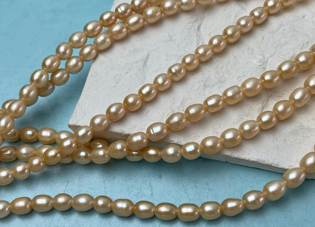 6-7 x 8-9 mm Large Hole Size 2.1 mm Rice/Oval Freshwater Pearls Beads Peach OR Light Champagne Color,Large Hole Bead #182