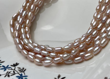 5x8-9 mm AA Natural Light Mauve Pink Rice/Oval Freshwater Pearl Beads Genuine Long Rice Freshwater Pearls #P2810