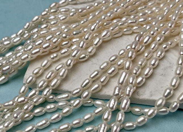 4x6.5-7 mm AA Tiny White Long Rice Oval Freshwater Pearls Long Oval Shape Seed Beads #1413