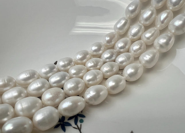 10-11x13-14 mm AA Natural White Rice/Oval Freshwater Pearl Genuine Natural Freshwater Pearl 26 Beads #86