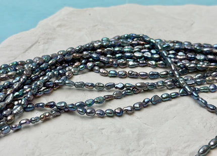 2-3x4-5 mm AA Blue Peacock Rice Nugget Tiny Freshwater Seed Pearls Beads 14 Inch Strand #P3477
