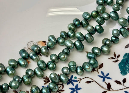 7x9-10 mm Top Drilled Persian Green Dancing Rice/Oval Freshwater Pearls 15 Inches Strand 65 Beads #P3504