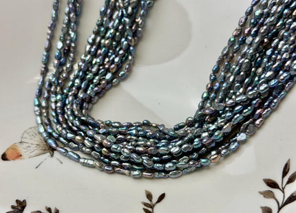 2-3x4-5 mm AA Blue Peacock Rice Nugget Tiny Freshwater Seed Pearls Beads 14 Inch Strand #P3477