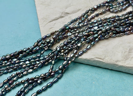 2-3x4-5 mm AA Blue Peacock Rice Nugget Tiny Freshwater Seed Pearls Beads 14 Inch Strand #P3477