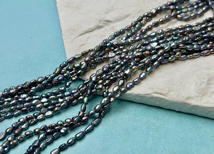 2-3x4-5 mm AA Blue Peacock Rice Nugget Tiny Freshwater Seed Pearls Beads 14 Inch Strand #P3477