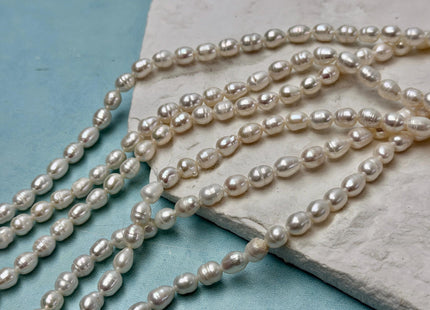 5-5.5x7-10mm Natural White Rice/Oval Freshwater Pearls Beads 14 Inch Strand #P3529