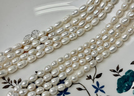 5-5.5x7-10mm Natural White Rice/Oval Freshwater Pearls Beads 14 Inch Strand #P3529