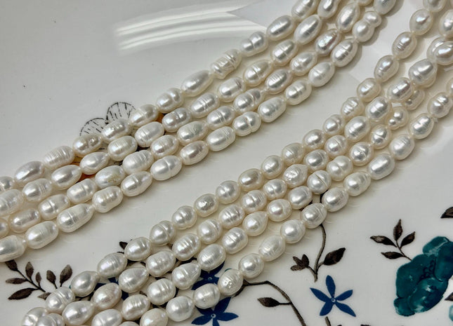 5-5.5x7-10mm Natural White Rice/Oval Freshwater Pearls Beads 14 Inch Strand #P3529