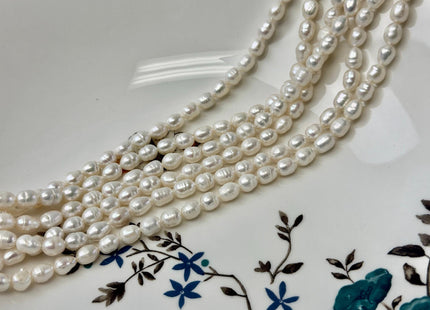 5-5.5x7-10mm Natural White Rice/Oval Freshwater Pearls Beads 14 Inch Strand #P3529