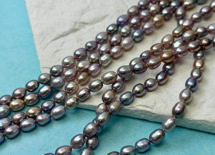 5-5.5x7-8 mm AA Natural Dark Mauve Pink Rice/Oval Freshwater Pearl 59 Beads #P3705