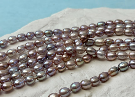 5-5.5x7-8 mm AA Natural Dark Mauve Pink Rice/Oval Freshwater Pearl 59 Beads #P3705