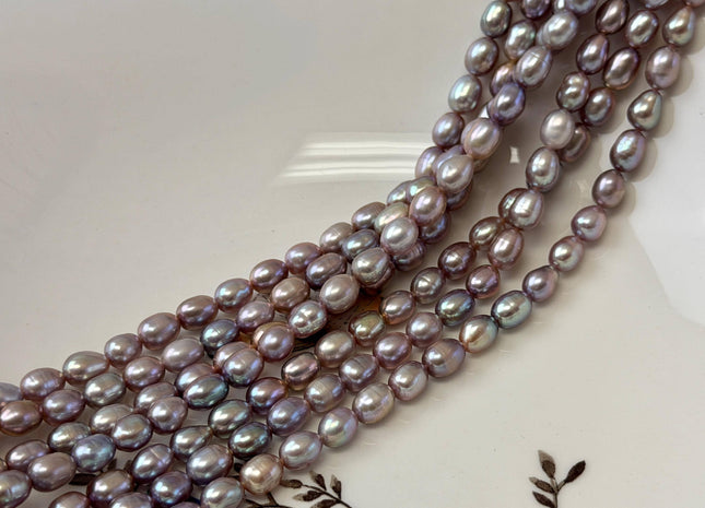 5-5.5x7-8 mm AA Natural Dark Mauve Pink Rice/Oval Freshwater Pearl 59 Beads #P3705