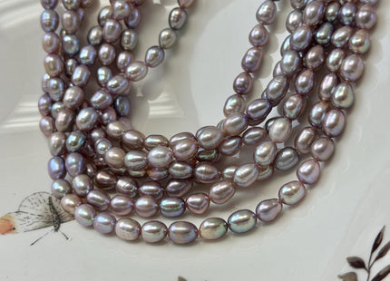 5-5.5x7-8 mm AA Natural Dark Mauve Pink Rice/Oval Freshwater Pearl 59 Beads #P3705