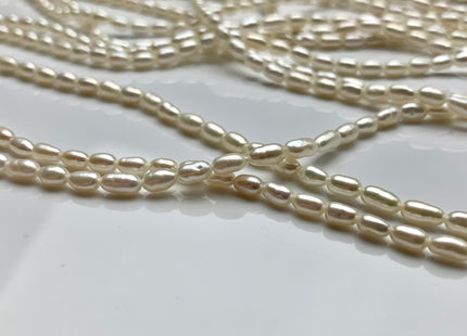 4x7 mm AA Tiny White Long Rice / Oval Freshwater Pearls Long Oval Shape Genuine Smooth And Shiny Freshwater Pearl Seed Beads #1413