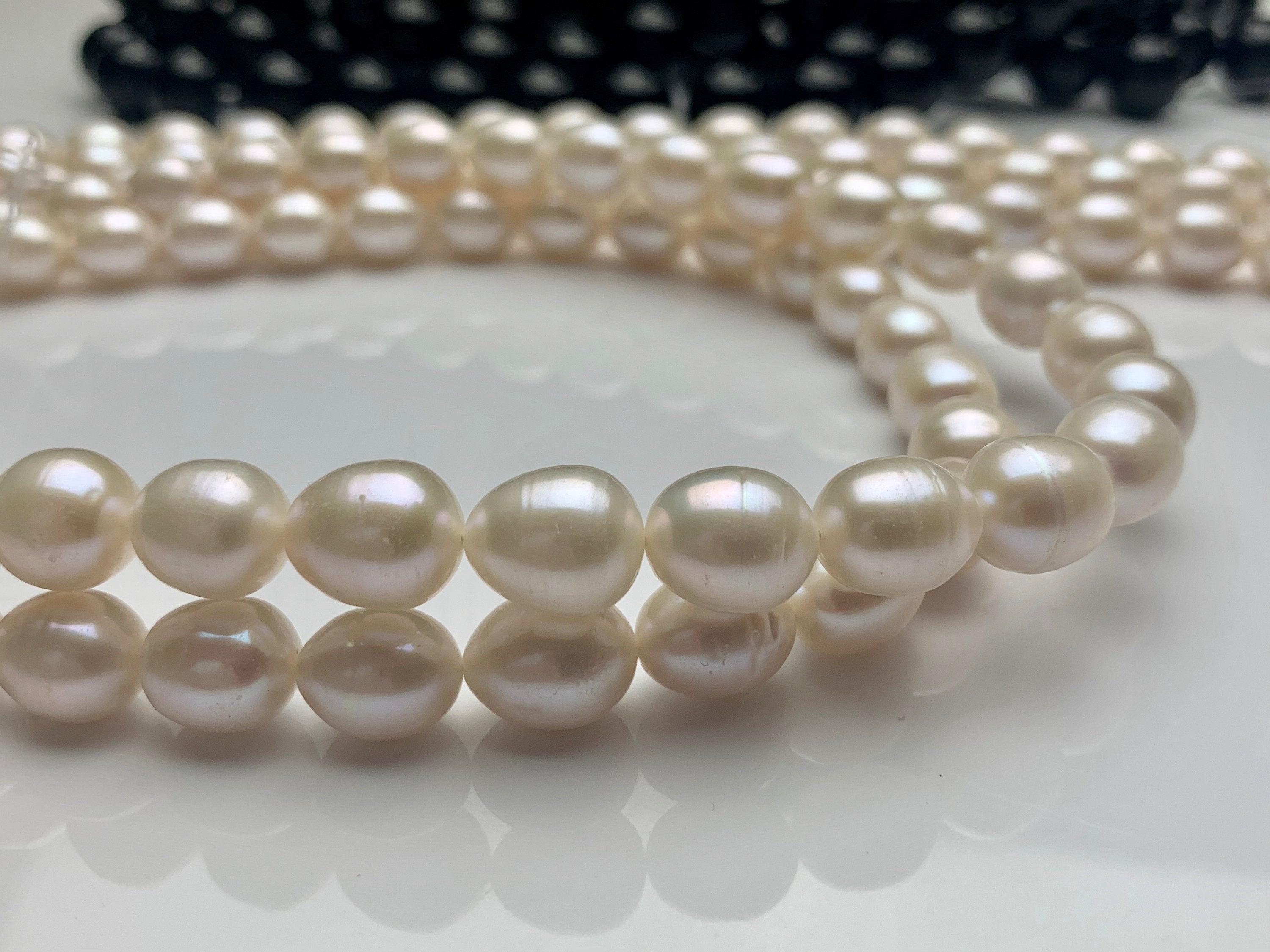 11-13mm Large Oval Shaped AA Quality White Rice Pearls Strands