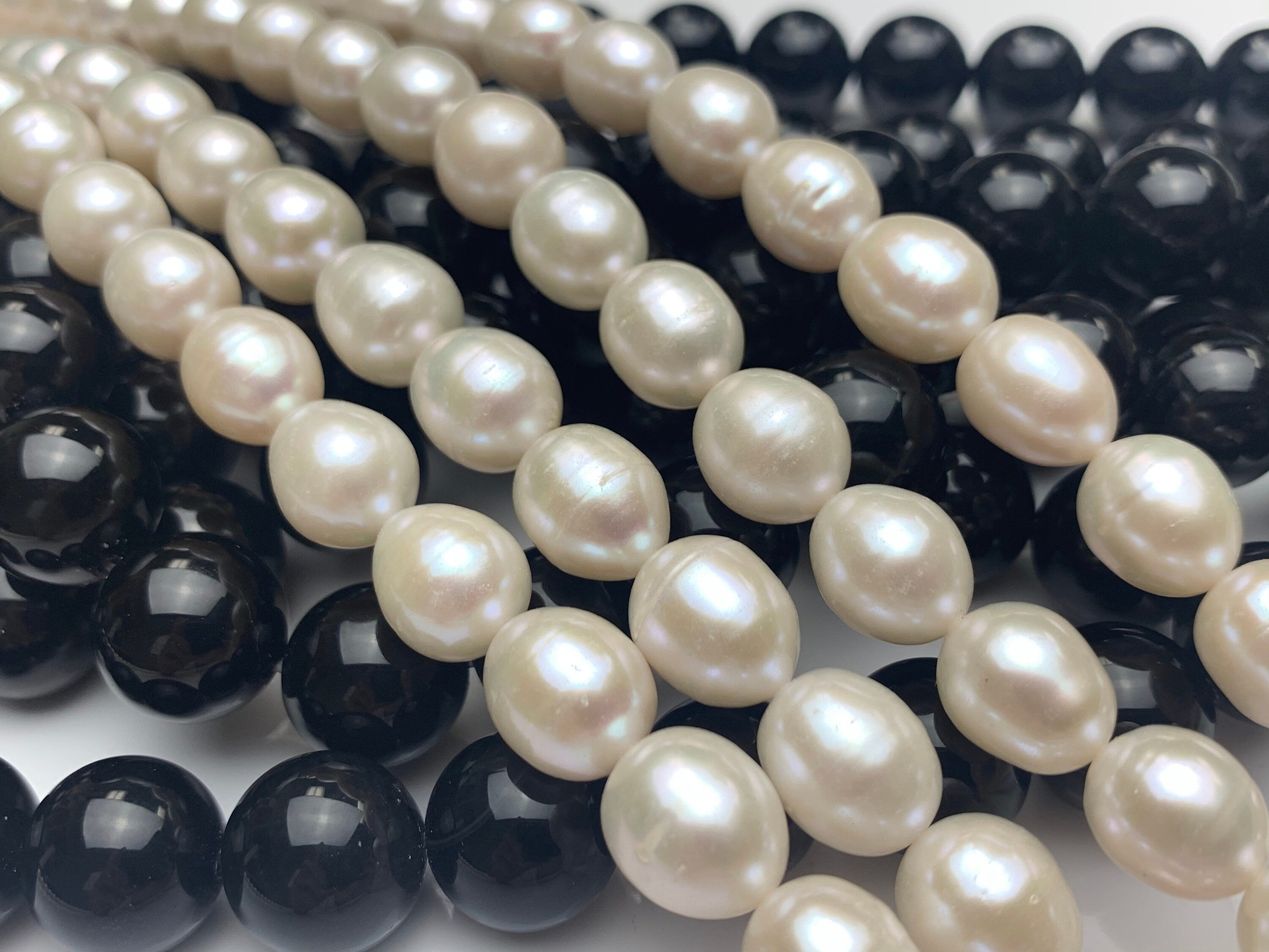 11-13mm Large Oval Shaped AA Quality White Rice Pearls Strands