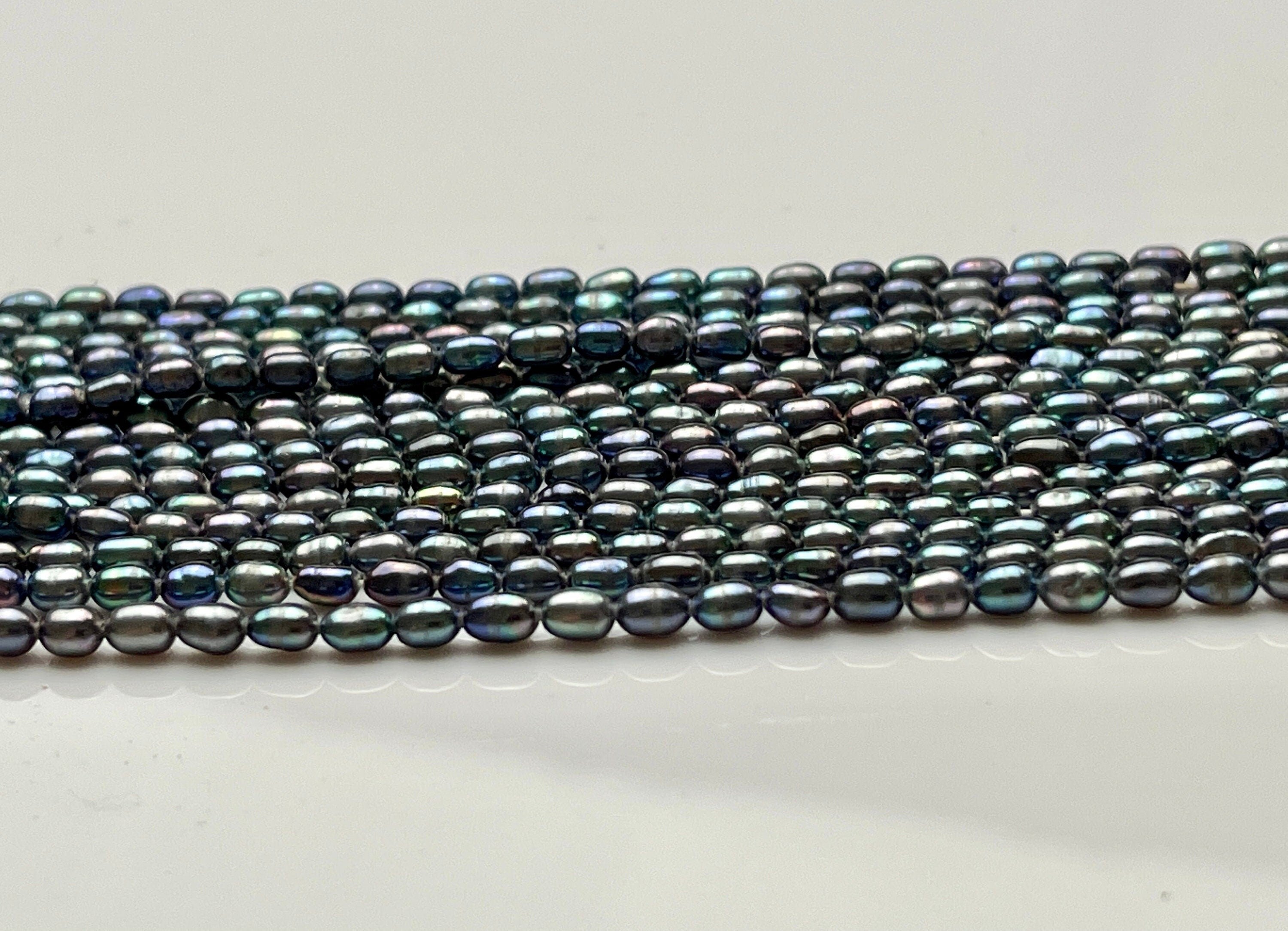 Glossy Peacock Keshi Pearls